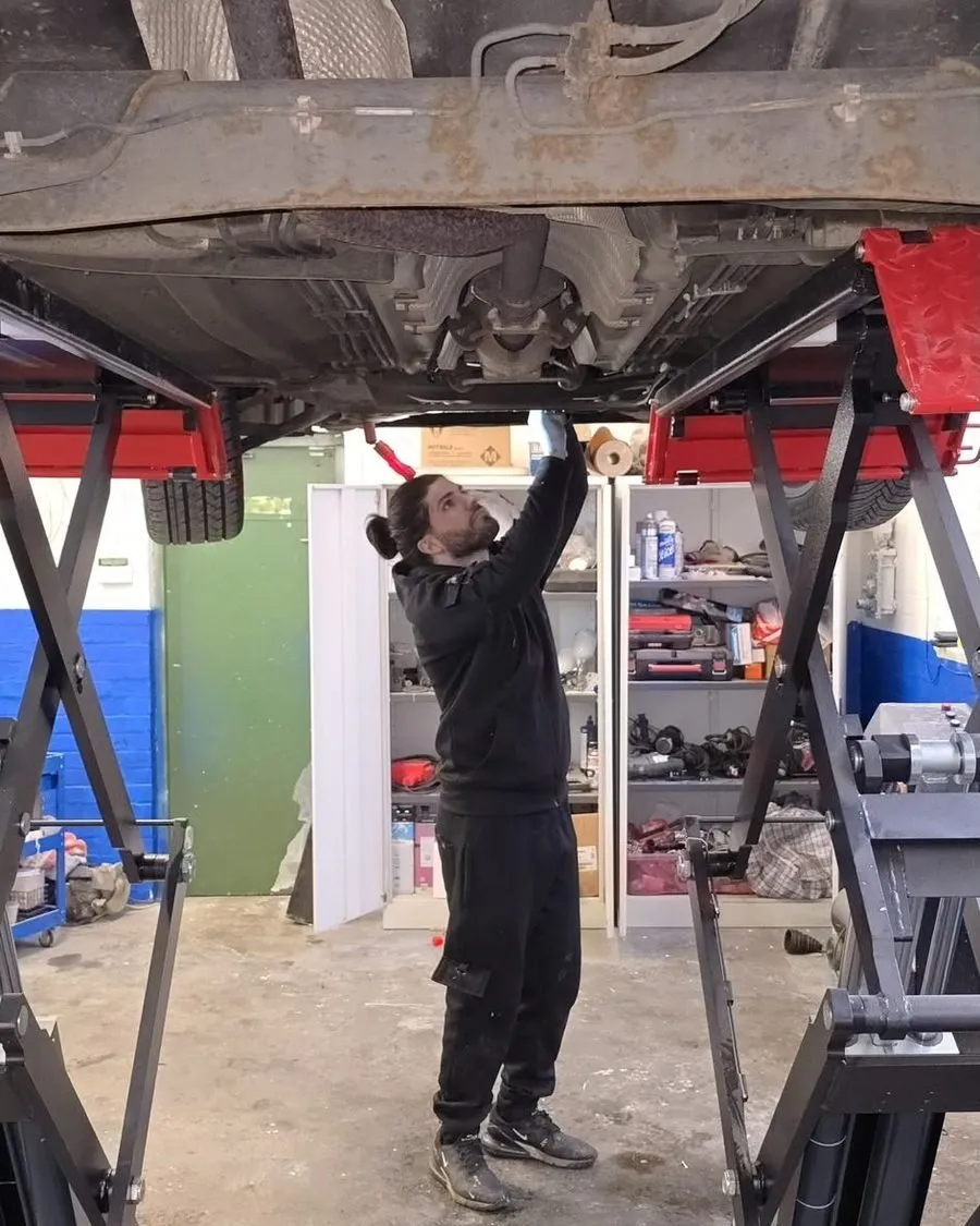 DPF cleaning at MCR Fast Fix, under the car on the exhaust